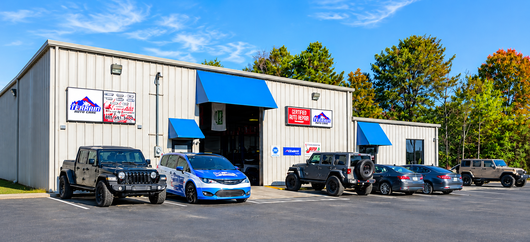 All Terrain Auto Care shop with blue awnings on Piney Grove Church Road
